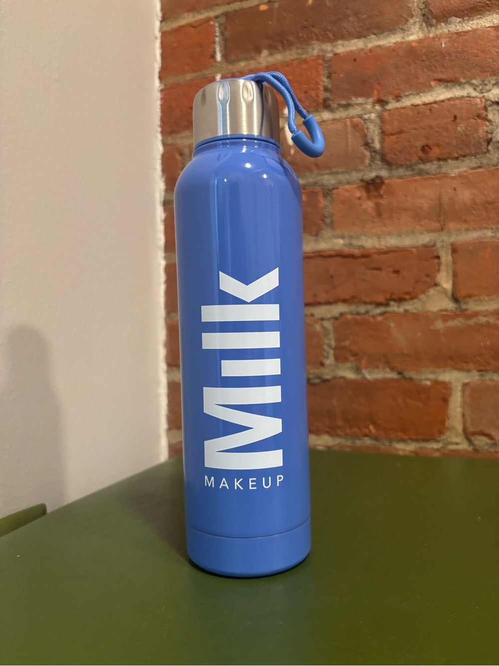 Milk Makeup Blue Metal Water Bottle with White Logo